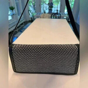 The Sak black shoulder back with woven black and white front. NEW